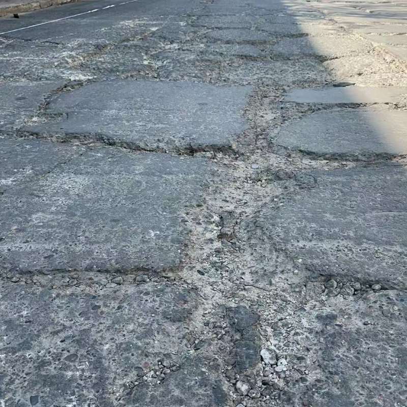 临渭路面起砂露石子修补料